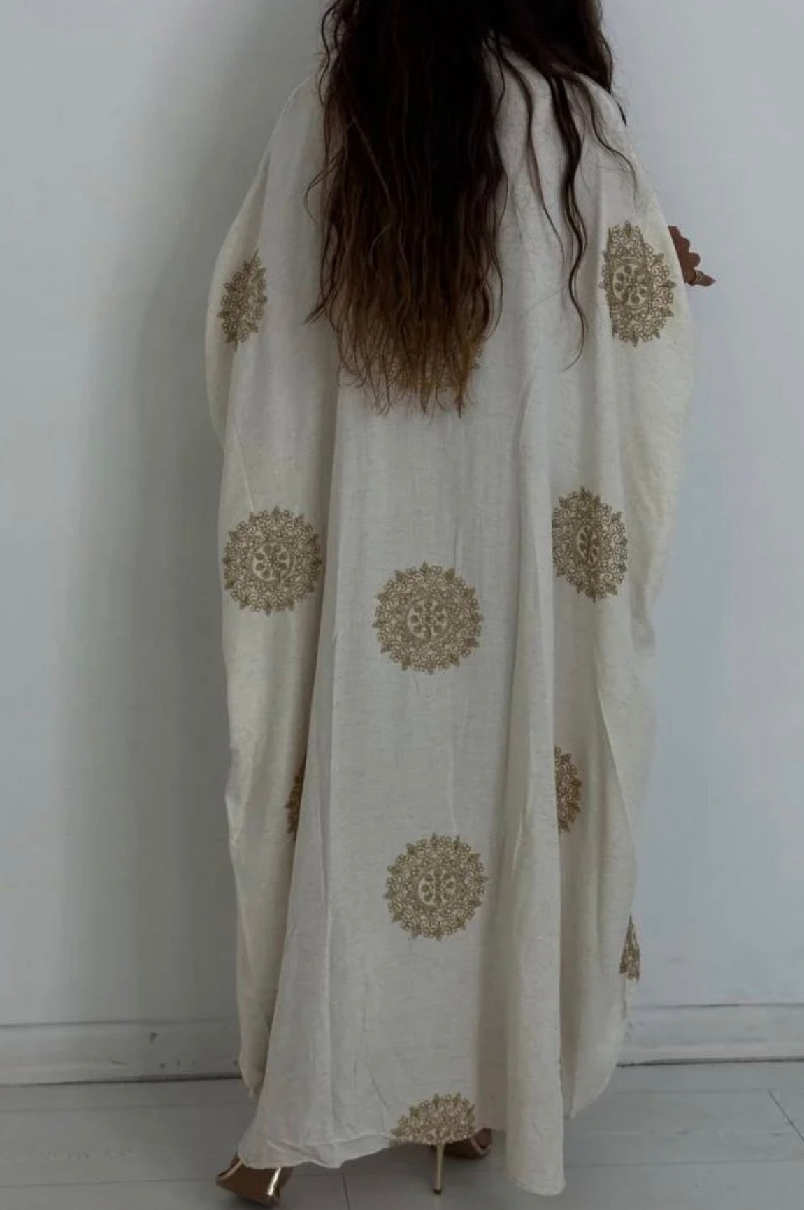 Beige dress embroidered with luxurious gold threads, made in Turkey