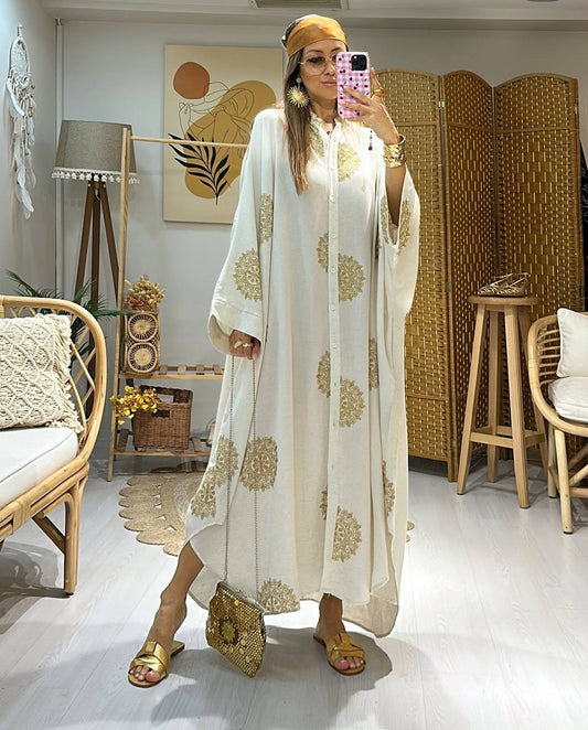 Beige dress embroidered with luxurious gold threads, made in Turkey